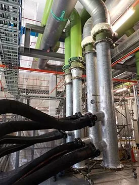Flexible chilled water hoses connected to fixed building piping